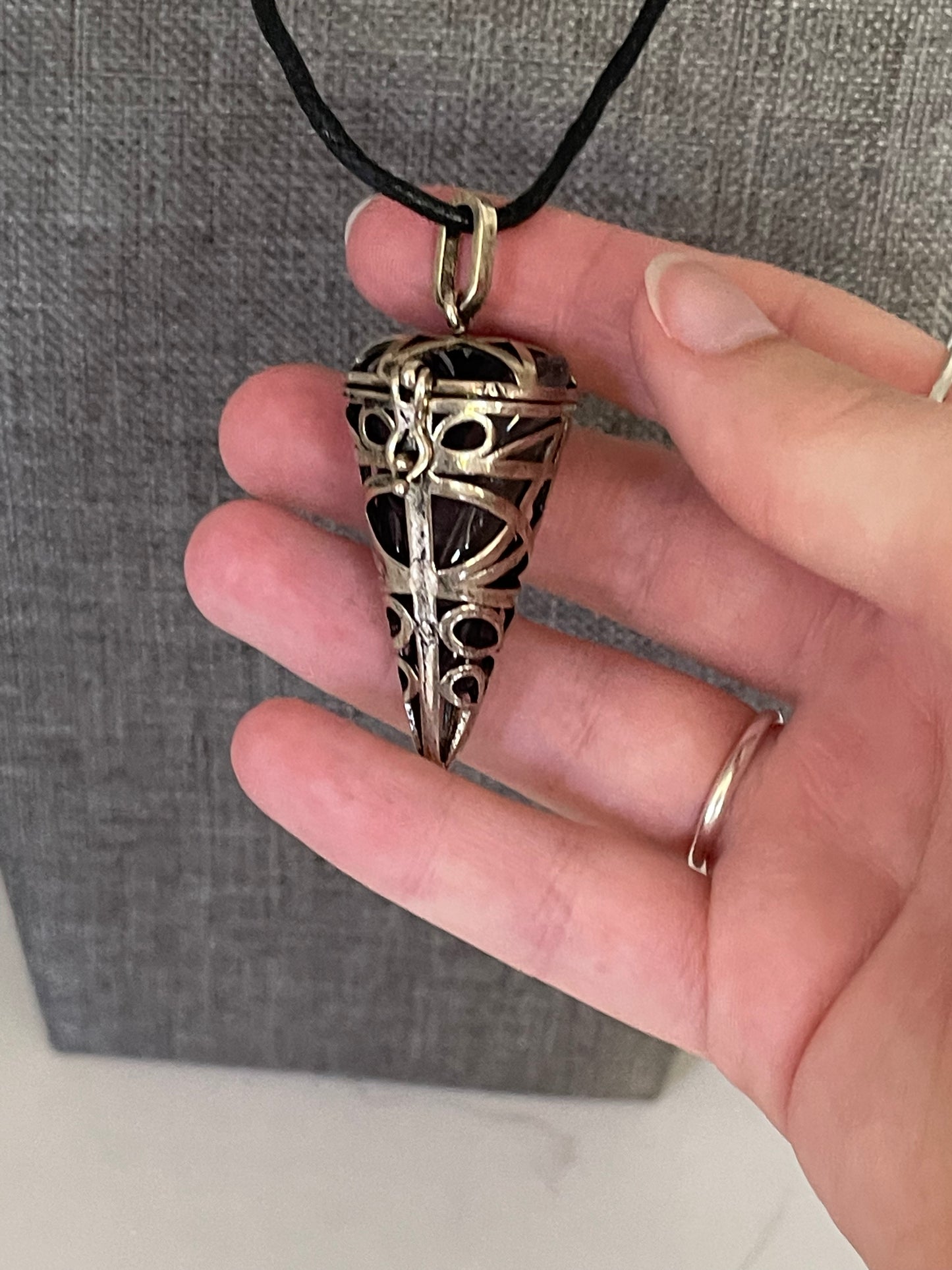 Antique silver-finished brass, bead/crystal cage with star design & latch